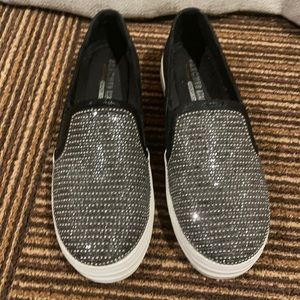 Skecher street slip ons